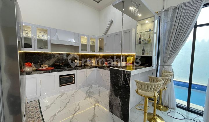 Rumah Mewah Full Furnished 2 Lantai dengan Luas 600 dan Bangunan 900 Siap Huni SHM Kolam Renang di Dalam 2