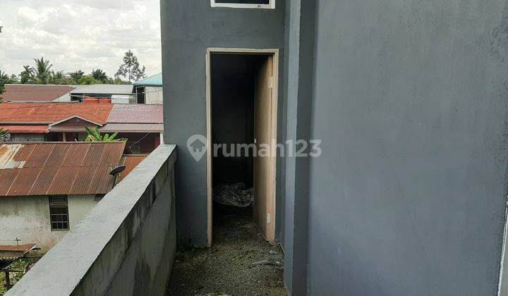 Ruko berukuran lebar, lokasi strategis di Jl. Tanjung Raya 2 8
