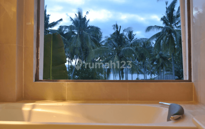 Junior Suite Villa with Ocean View Balcony | 50 sqm at Hotel Crystal Beach Bali (Karangasem, Candi Dasa) 2