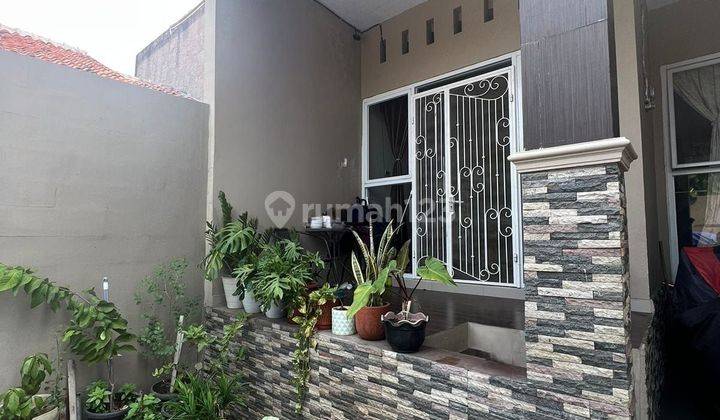 Rumah Lapang Modern Bonus Halaman 1