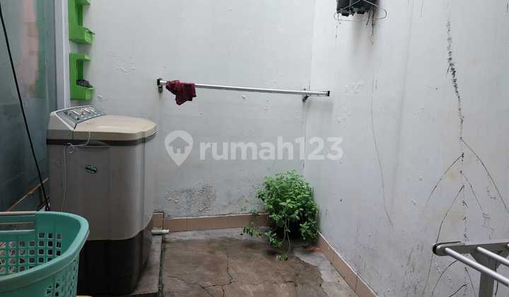 Rumah Full Furnished One Gate System di Perumahan Kuta Palace Residence 2