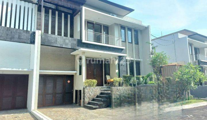 One Gate System House for Sale in Harvestland Kuta Housing Complex 1