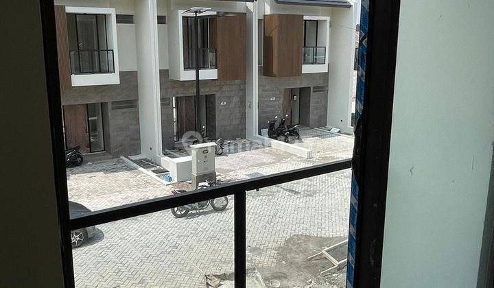 Jual rumah baru Central Park Juanda  1