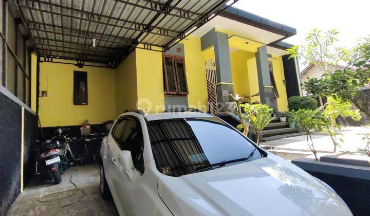 RUMAH MINIMALIS MODERN HALAMAN LUAS DI PURWOMARTANI  2