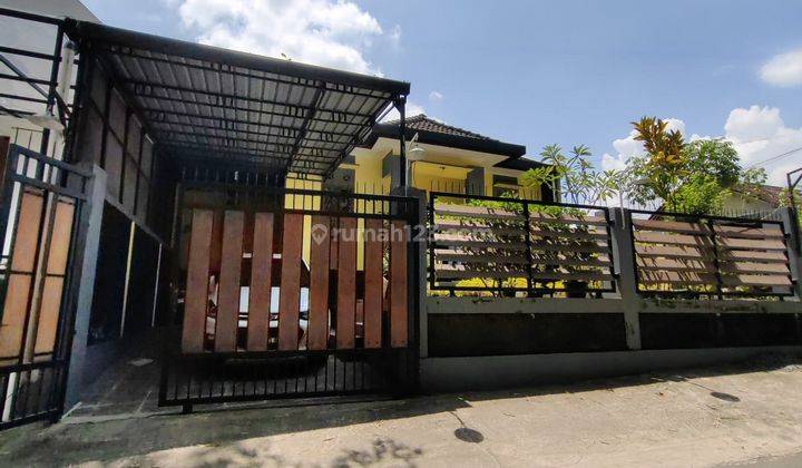 RUMAH MINIMALIS MODERN HALAMAN LUAS DI PURWOMARTANI  1