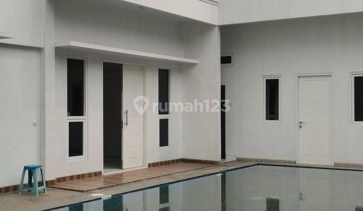 Rumah Cantik Ada Swimming Pool di Tosiga Kebon Jeruk Jakarta Barat 1