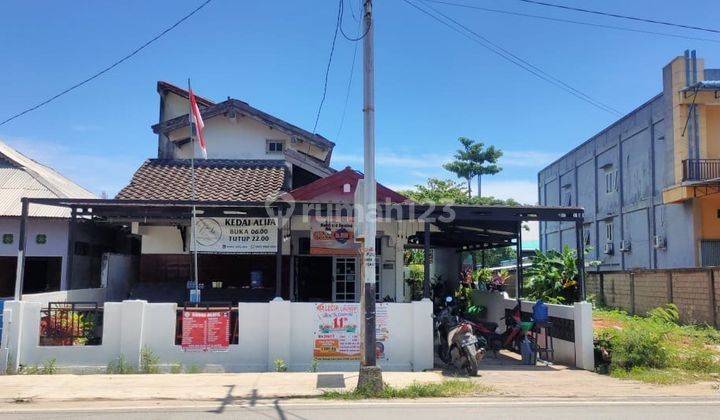 RUMAH TEPI JALAN SINGKAWANG.JL ALIANYANG 2