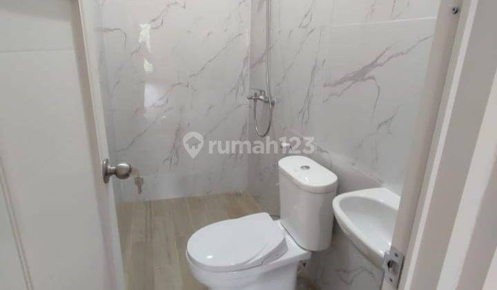 RUMAH MEWAH 2 LANTAI DI JL PEMUDA RAWAMANGUN JAKARTA TIMUR 12
