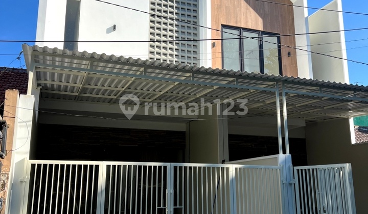Jeffry-Dijual rumah minimalis modern 2 lantai baru "Grezz" fully furnished di Rungkut Menanggal