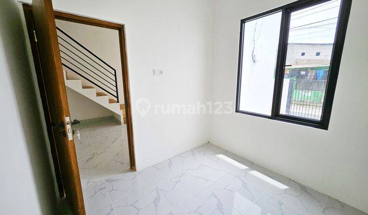 Rumah Modern Minimalis 2 Lantai Di Pondok Ungu Permai 2