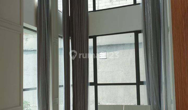 kan Apartemen Kemang Village Bloomington Tower 1