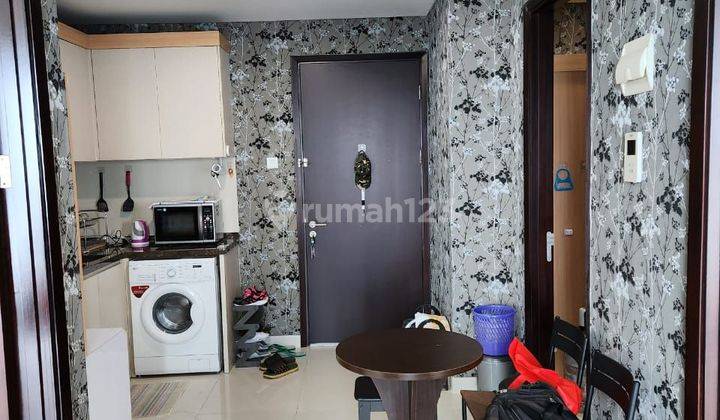 Fully Furnished 2 Kamar Tidur Apartemen Puri Mansion 1