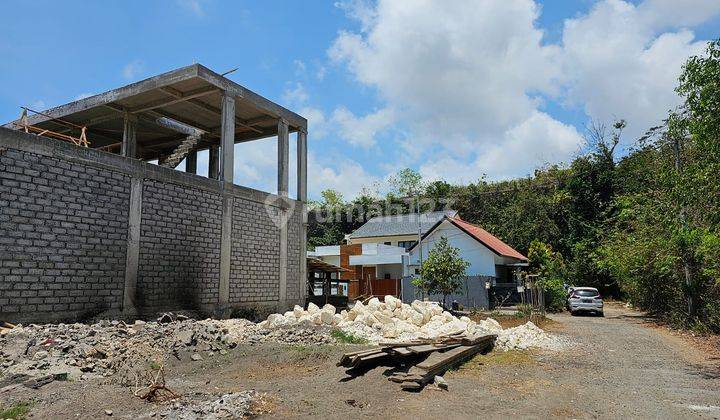 Tanah Berlokasi Hook di Pinggir Jalan Pura Masuka, Ungasan, Bali 1