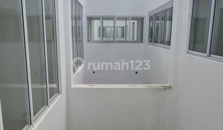 Rumah di Green lake city 17