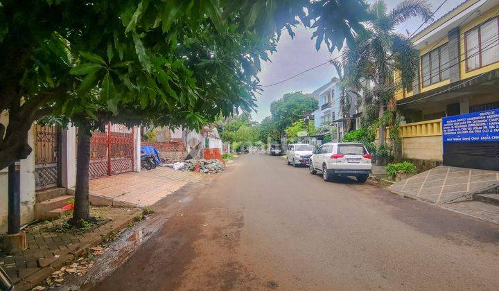 rumah di jalan utama ke 2 di puri indah, row jalan depan 15m dengan lebar ideal 2