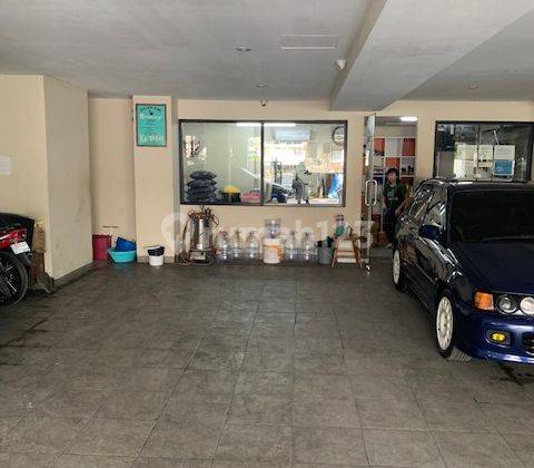 for sale: a fully occupied boarding business, 54 rooms in Grogol Makaliwe, located near universities, hospitals, and office areas.