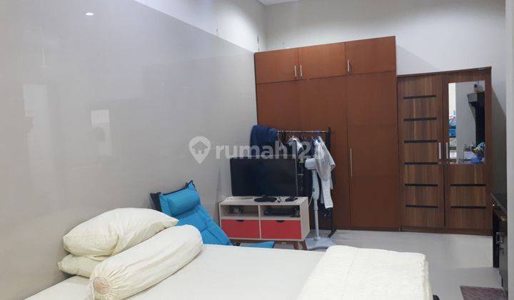 Rumah minimalis dengan pemandangan sawah 5
