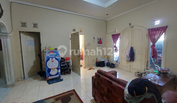 Well-Maintained Building House Near Main Road in Nata Endah 2