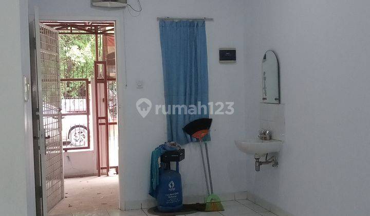 Rumah Tepi Jalan Raya Siap Huni di Harapan Indah 1