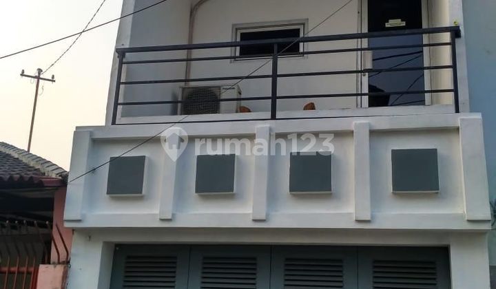 Rumah 2 lantai lingkungan asri