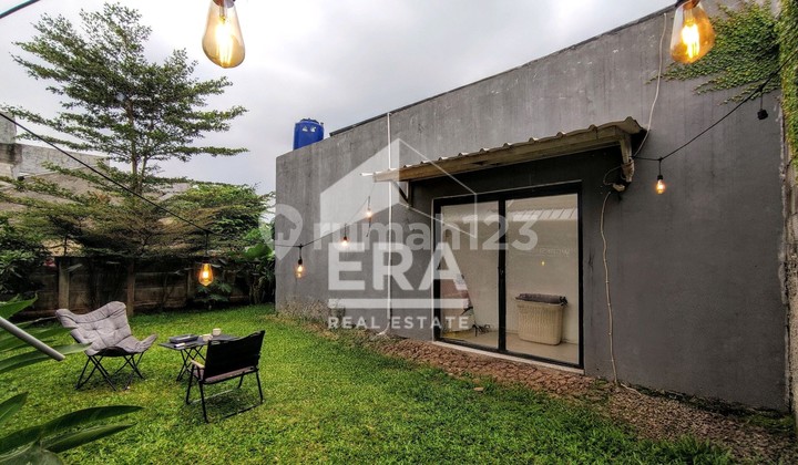 Rumah tanah dan halaman luas model Hoek di villa kebun Raya cibinong estate