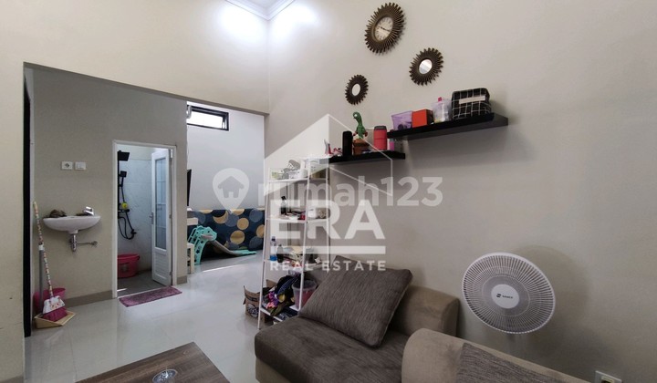 Rumah di dalam Cluster di jalan raya Pitara Depok 