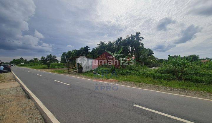 Tanah Tepi Jalan Raya Lokasi Dekat Supadio International Airport