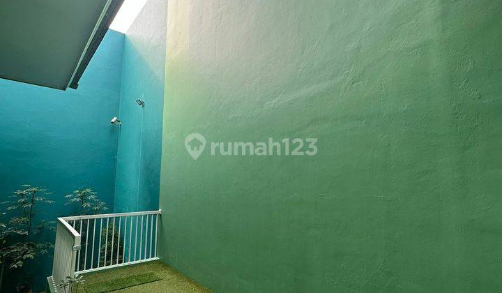 Rumah dengan bangunan split level di Grand Wisata 2