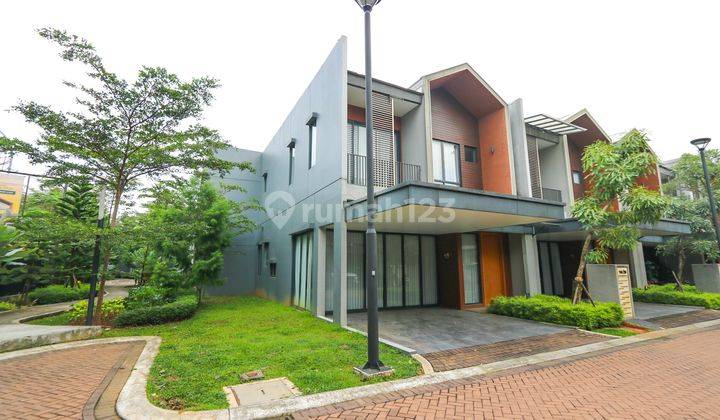 tampak depan rumah hoek mewah & modern