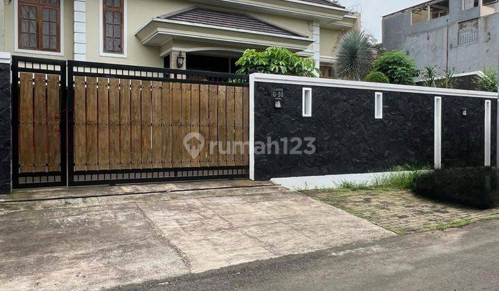 RUMAH CANTIK DESAIN LAPANG SIAP HUNI DI CINERE ESTATE DEPOK 1