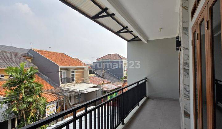 Rumah baru full renovasi dalam komplek billymoon pondok kelapa 2