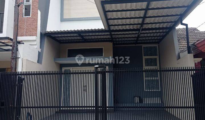 Rumah SHM, 2 lantai, msh baru, siap huni, carport bisa 2 mobil 1