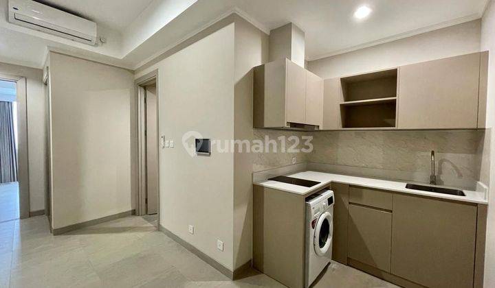 Apartemen Menara Jakarta 2 Kamar Tidur Bagus Unfurnished 1