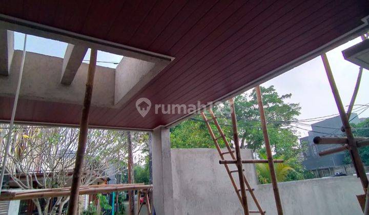 Rumah 2 Lantai Modern Kontemporer Tropis di Kencana Loka B S D 2