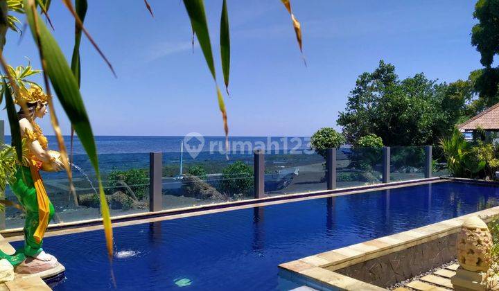 PRICE DROP.NEW BEACH FRONT VILLA IN LOVINA 1