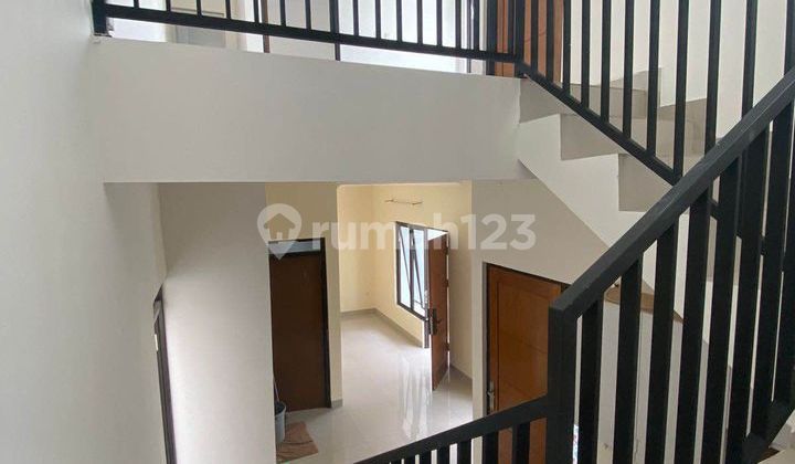 Rumah Baru Murah Bagus Unfurnished SHM Cluster di Sariwangi Atas