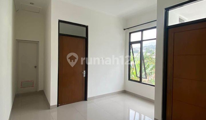 Rumah Baru Murah Bagus Unfurnished SHM Cluster di Sariwangi Atas 2