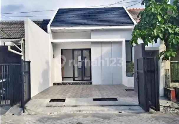 Nice Ready-to-Occupy House in Wiguna Tengah Surabaya, Strategic Location.
