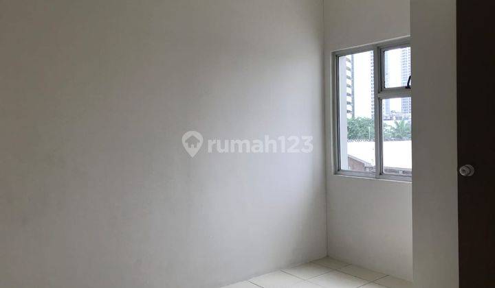 Disewakan Unfurnish 2BR Apartemen Mediterania Garden 2 1