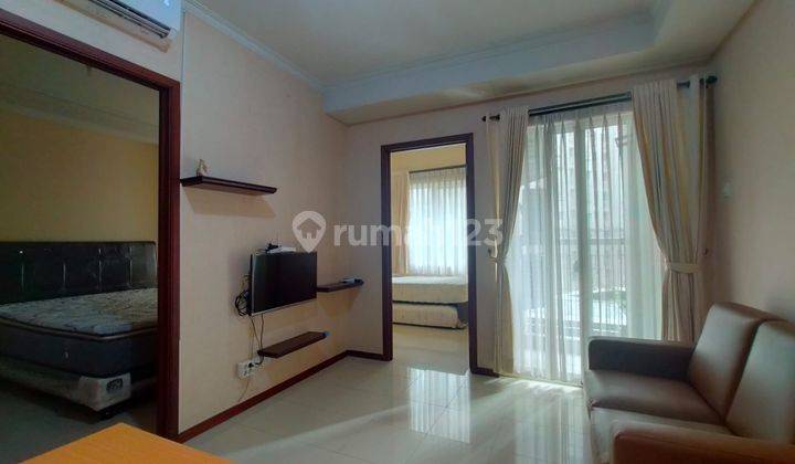 Sewa 2BR Full Furnish Lantai Rendah Apt. Royal Mediterania Garden 1