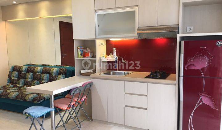 Disewakan 2BR+ 1 Furnish Lt. Rendah Apt. Royal Mediterania Garden 1