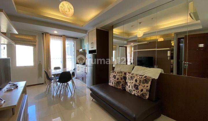 2BR Interior Cakep View Central Park Apt Royal Mediterania 1