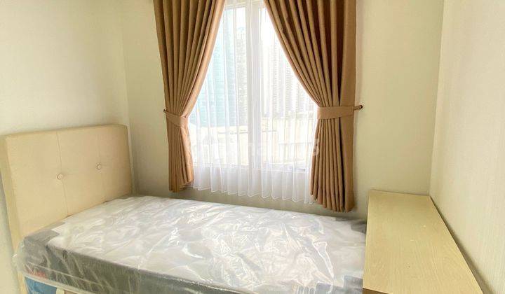 2BR Interior Cakep View Central Park Apt Royal Mediterania 2