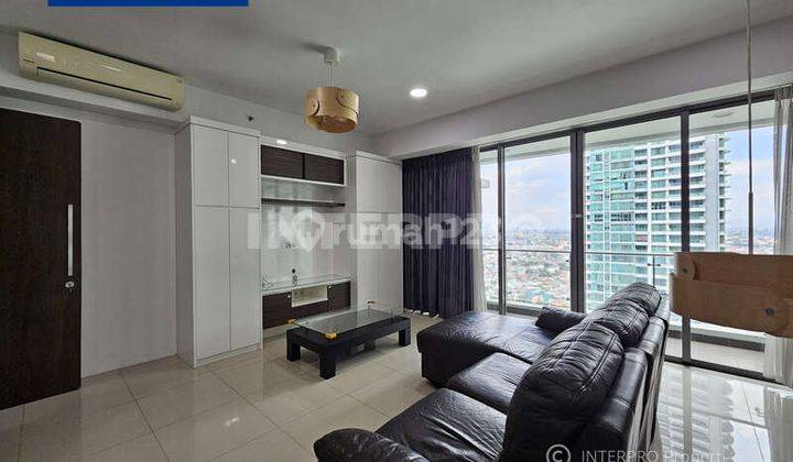 ruang tamu apartemen st moritz puri indah