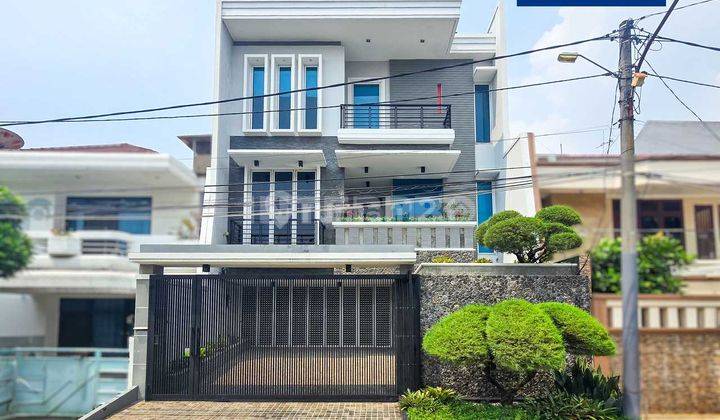 Rumah Minimalis Modern Siap Huni di Green Garden Luas 220m2 1