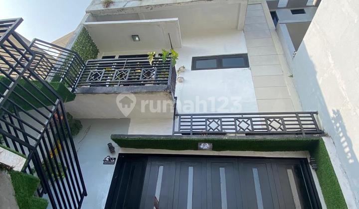 Rumah View Kota Jual Cepat Di Cigadung Greenland