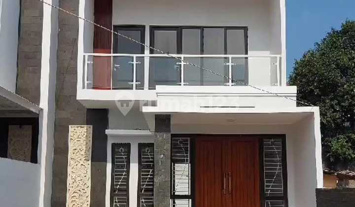 Rumah Bali Modern di Pinggir Jalan Lokasi Dekat Tol Margonda 1