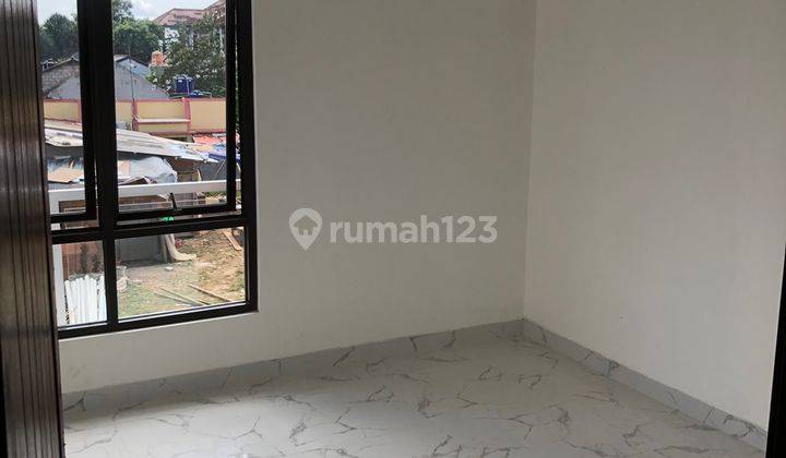 Cluster di Sukatani di Pinggr Jalan Raya Akses Dekat Tol Cisalak 15