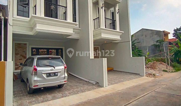 Rumah Mewah Classic Plus Rooftop dekat Tol Kukusan 2