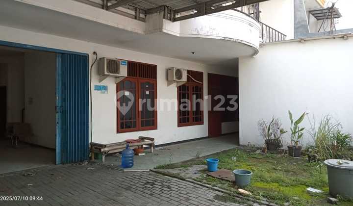 A 2-story former boarding house in Siwalan Kerto, ND 1